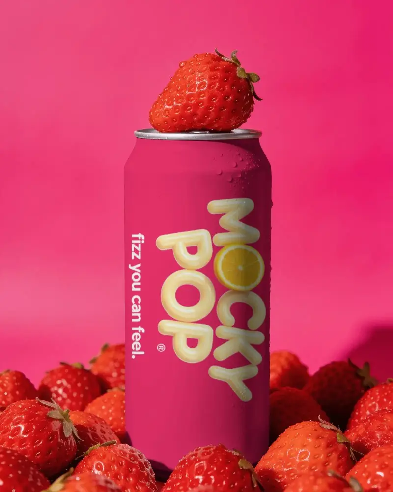 Sleek Metal Can Mockup With Fresh Strawberry Fruit Surrounded By Harvested Strawberries