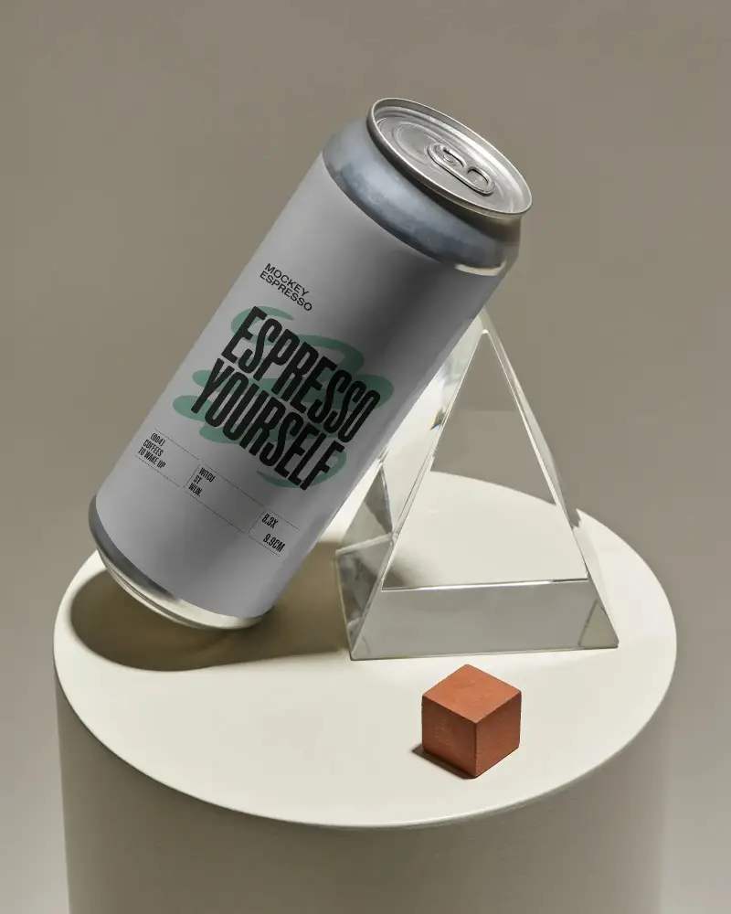 Sleek Tall Aluminum Beverage Can Mockup On Clear Pyramid Stand With Cube Prop