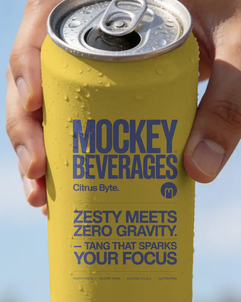 Realistic Cold Drink Can Mockup With Water Droplets And Hand Holding Outdoor Visual