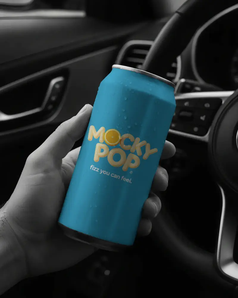 Realistic Can Mockup With Water Droplets In Hand Inside Modern Car Interior