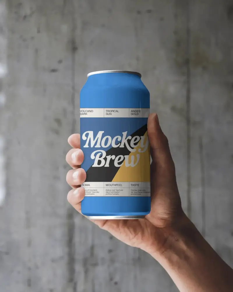 Can Mockup In Hand Against Textured Wall With Soft Lighting And Natural Skin Tone Grip
