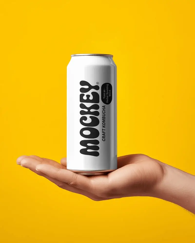 Blank Metal Can Mockup In Hand Holding With Clean Background Ready For Custom