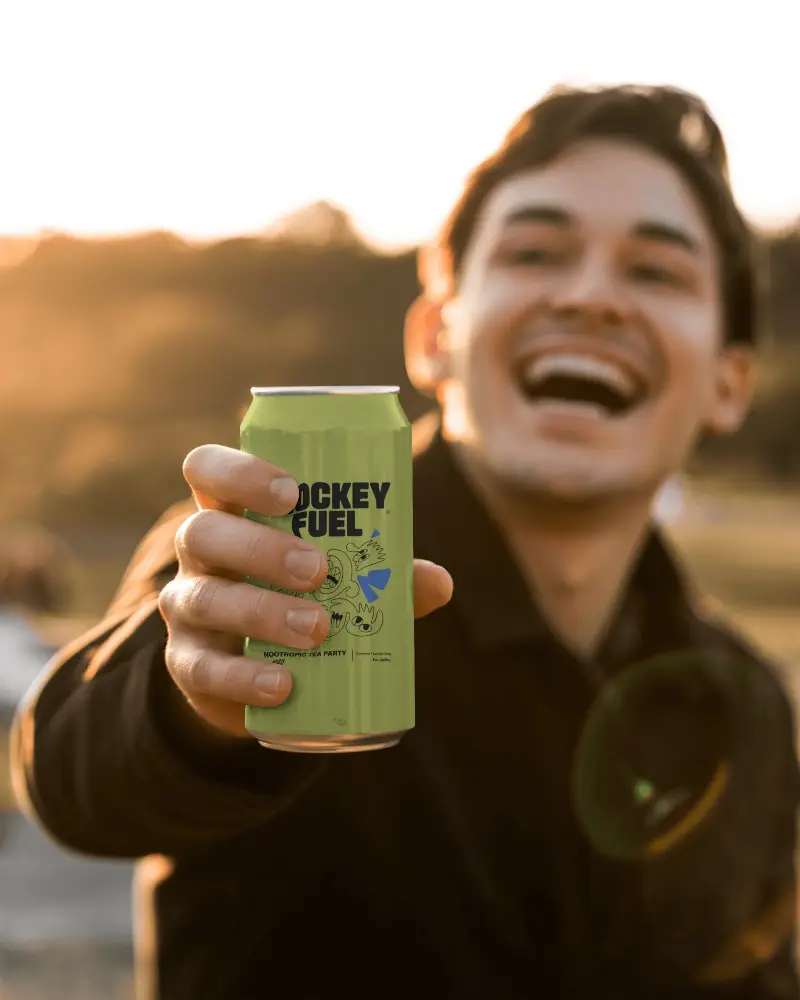 Joyful Outdoor Can Mockup Happy Man Holding Drink In Sunset Golden Hour Lighting