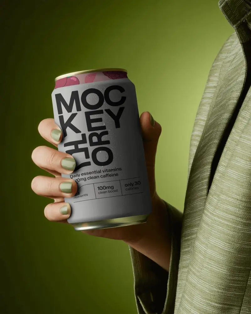 Elegant Green Can Mockup Hand Holding Beverage With Matching Nails And Fabric
