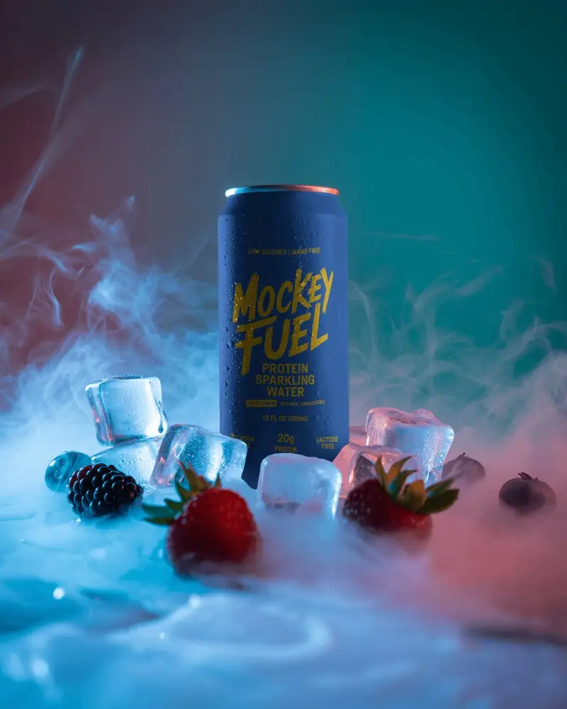 Chilled Beverage Can Mockup Black Can With Ice Cubes And Berries In Cool Misty Light