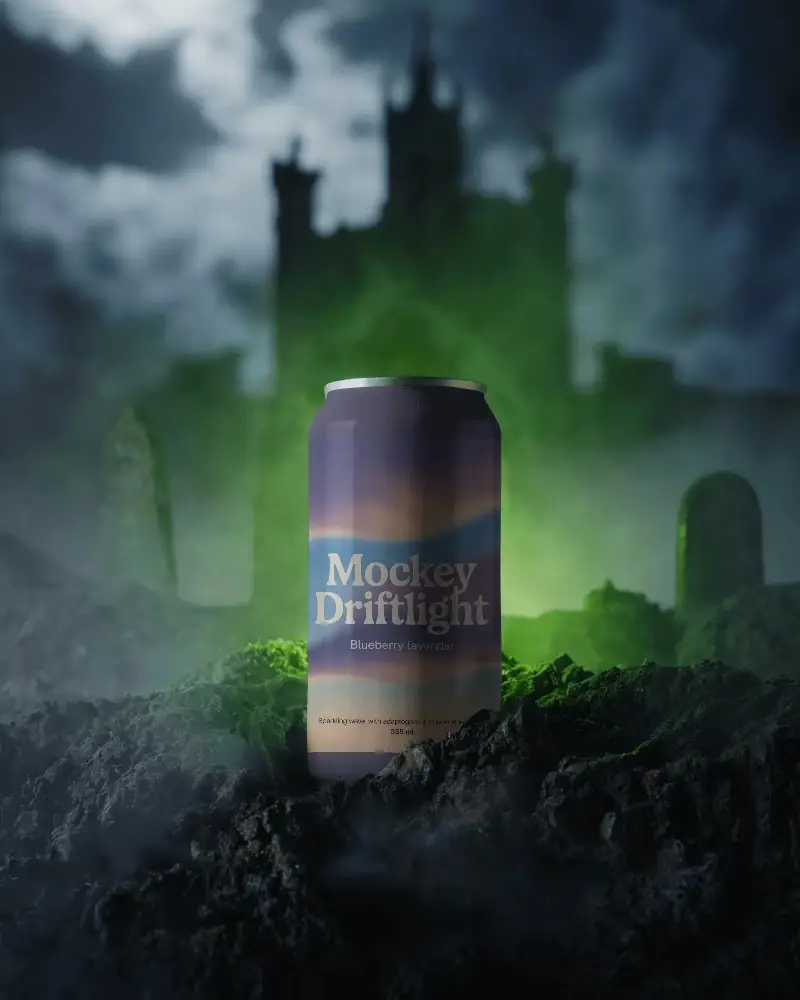 Spooky Themed Beverage Can Mockup With Mystical Glowing Background And Graveyard