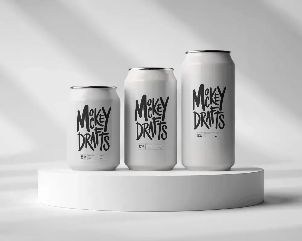 Blank Aluminum Can Mockups On Round Platform For Beverage Packaging Design Display
