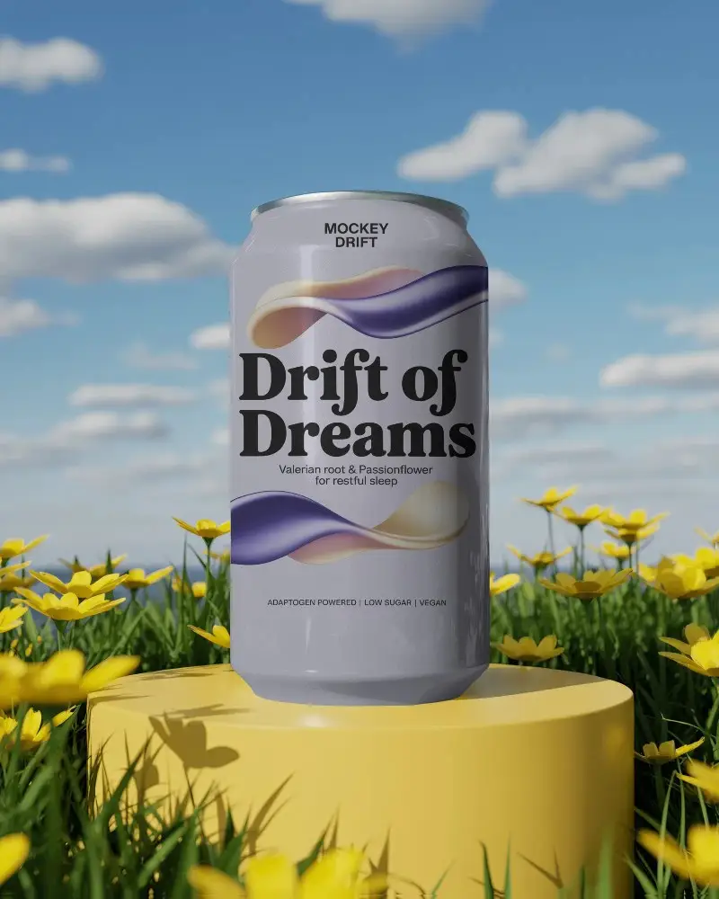 Blank Soda Can Mockup On Circular Stand Surrounded By Wildflowers And Blue Sky Background