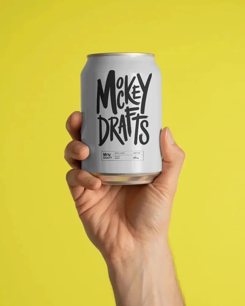 Hand Holding Blank Metal Can Perfect For Beverage Packaging Mockup Design Showcase