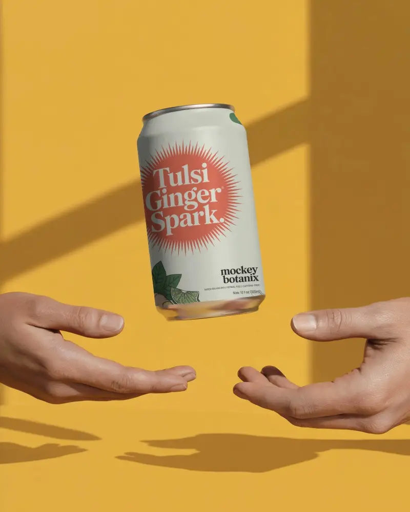 Floating Can Mockup Bright Yellow Backdrop Hands Ready To Catch In Studio Light High Contrast