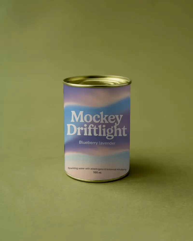 Elegant Can Mockup On Olive Surface Subtle Lighting Soft Gradient Label Minimal Serene Atmosphere