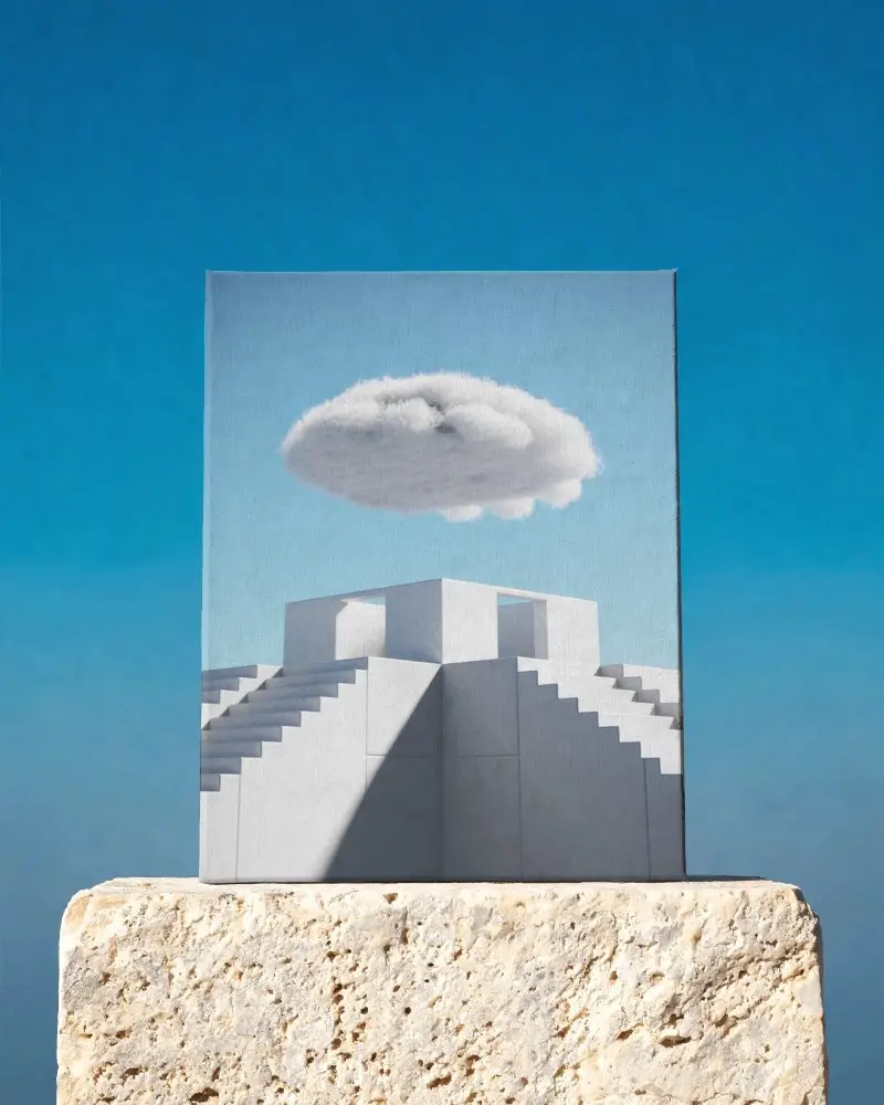 Vertical Canvas Mockup On Natural Stone Base With Bright Blue Cloudless Background