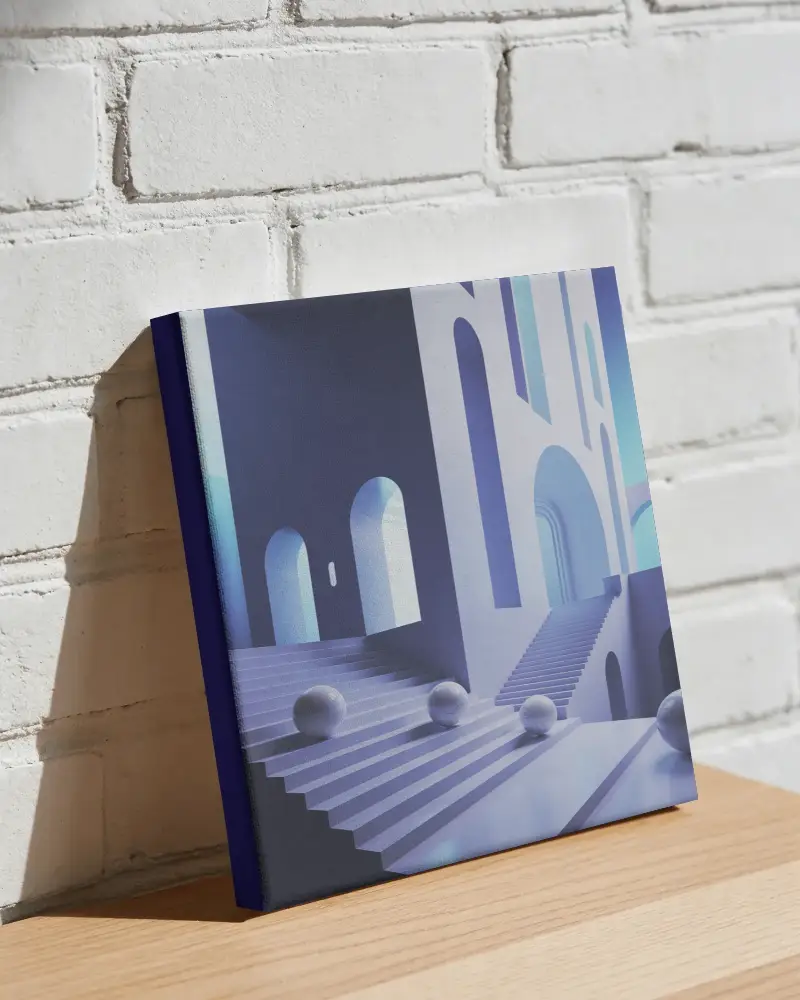 Canvas Mockup Leaning Against Textured Wall On Clean Modern Wood Table