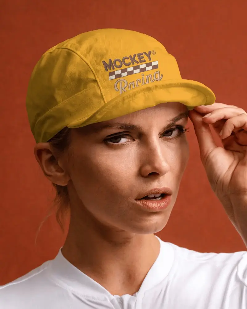 Female Model Wearing Tennis Cap Adjusting Brim With Intense Gaze In Studio Lighting