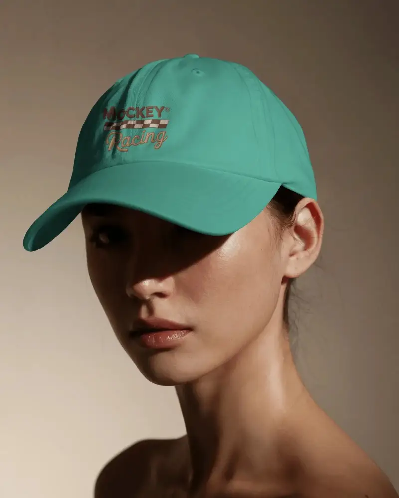 Sunset Lit Cap Mockup Woman Facing Forward In Warm Toned Studio Scene Minimal Backdrop