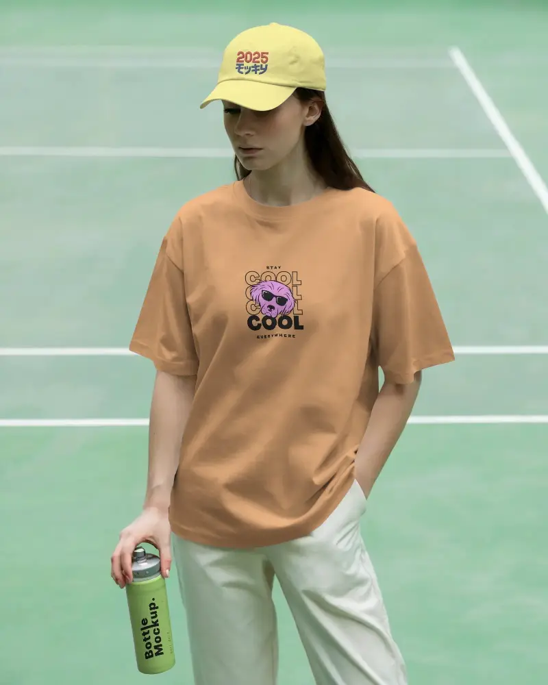 Casual Loose Fit Tshirt Mockup With Cap Holding Water Bottle At Sports Court Lifestyle