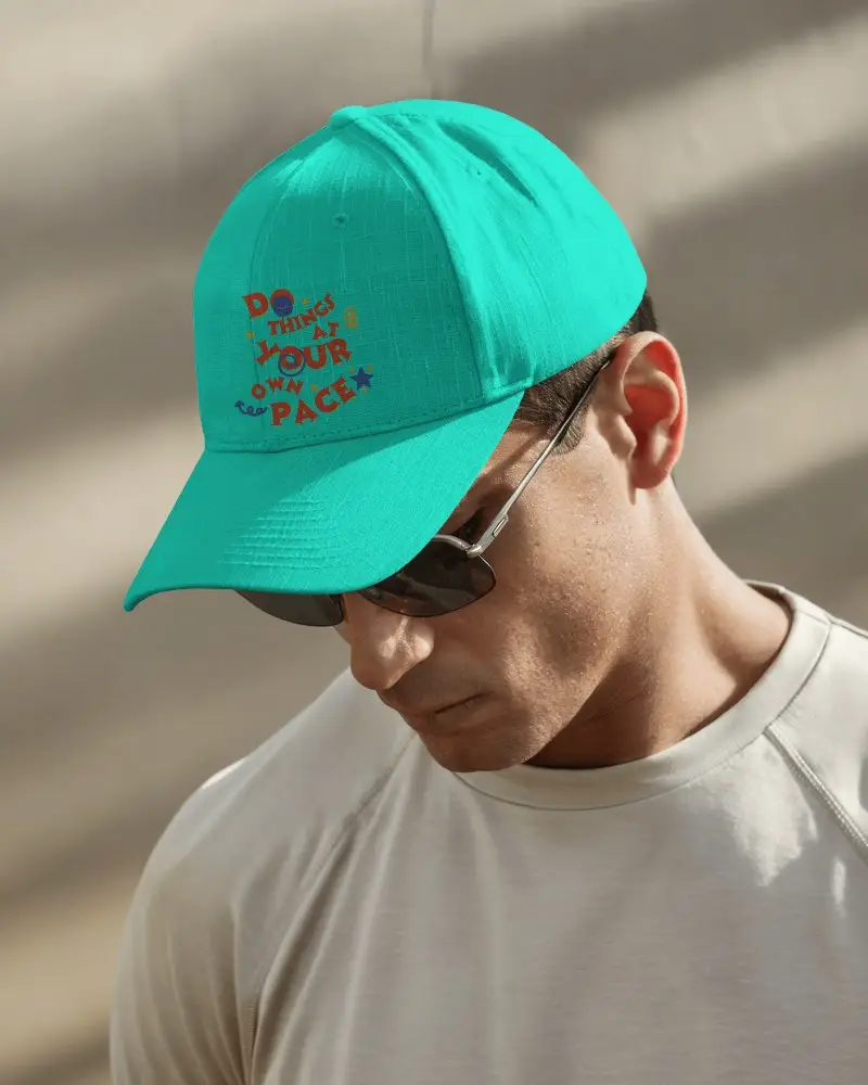 Sunlit Outdoor Baseball Cap Mockup On Man Wearing Sunglasses And Beige Shirt Looking Down Soft Shadows And Natural Light
