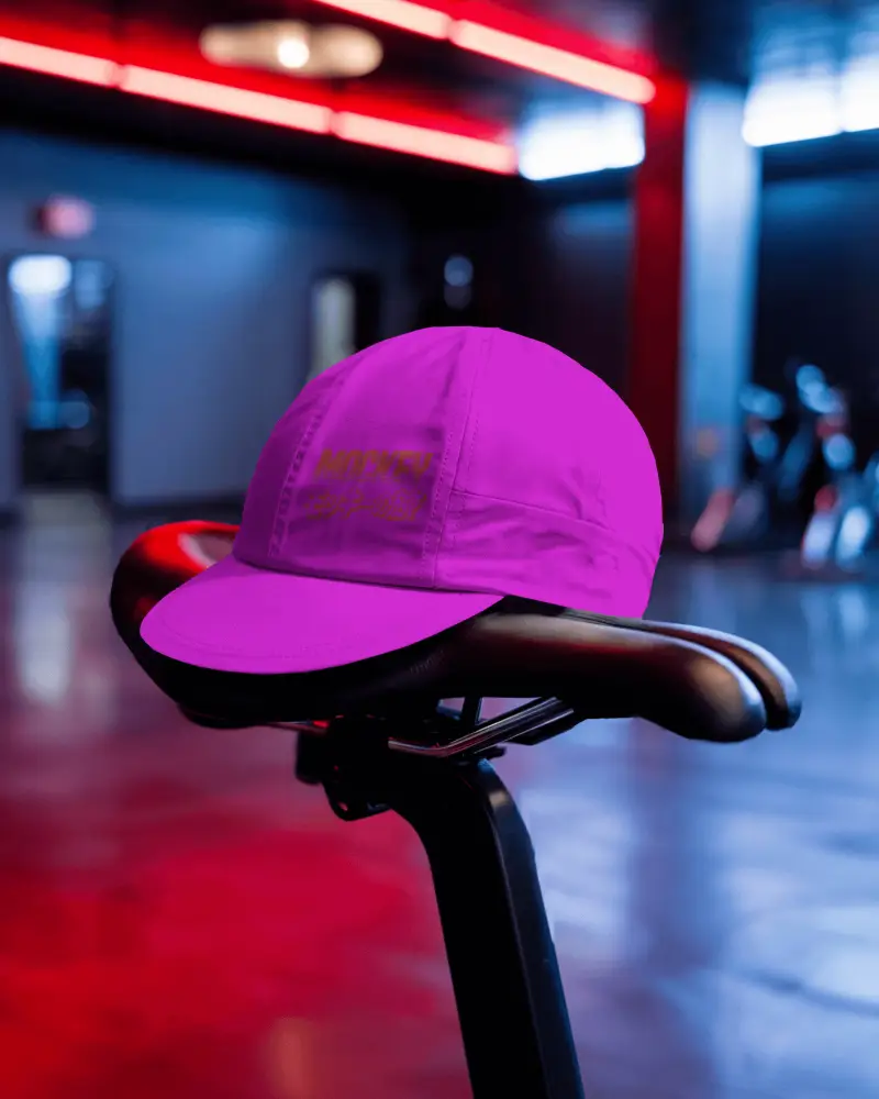 Indoor Gym Cycling Cap Mockup Balanced On Saddle With Glow Neon Light And Fitness Ambience