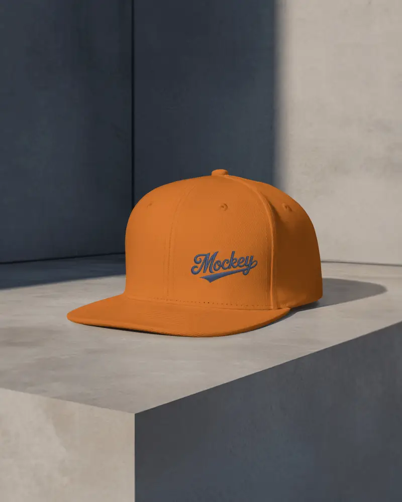 Minimalist Studio Cap Mockup Flat Bill Hat Placed On Modern Stone Surface With Shadows