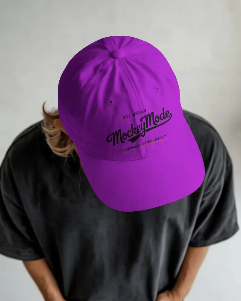 Casual Baseball Cap Mockup Male Model Looking Down In Dark Oversized Shirt Minimal Studio Scene