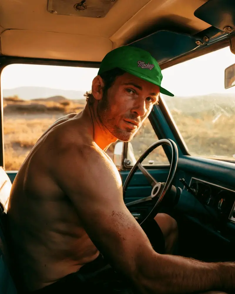 Sunset Cap Mockup With Outdoor Adventure Vibe In Vintage Car Dusty Road