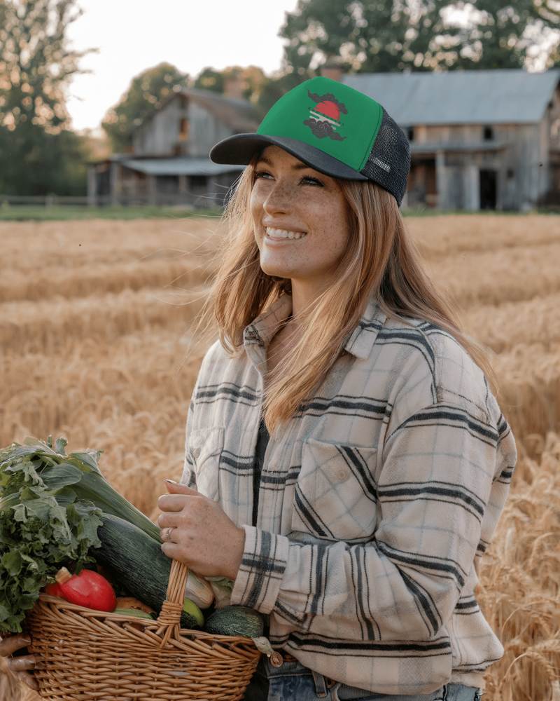 Country Lifestyle Trucker Hat Mockup Happy Female Farmer In Rural Barn Setting With Organic Vegetables