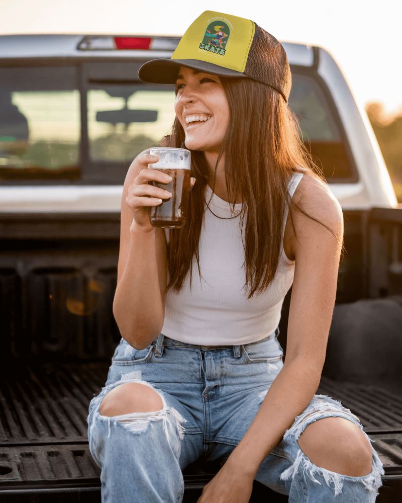 Laidback Sunset Hat Mockup Fashionable Woman Wearing Trucker Cap And Ripped Denim In Country Setting