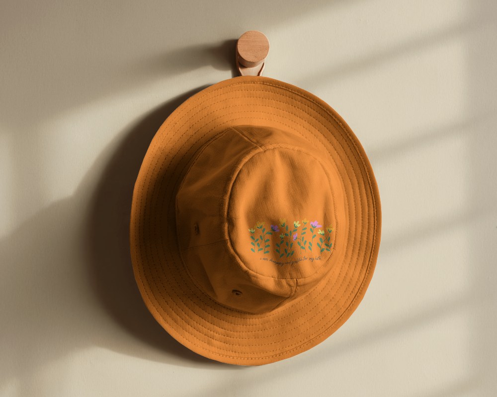 Sunlit Hat Mockup On Wooden Hook With Soft Shadow Play On Wall