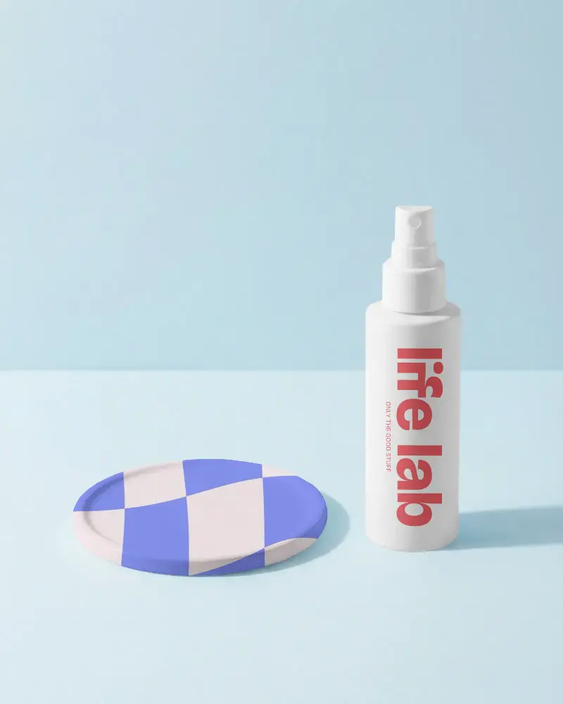 Sleek Simple Circular Coaster Mockup Aerosol Spray Bottle Mockup In Soft Natural Light Setting