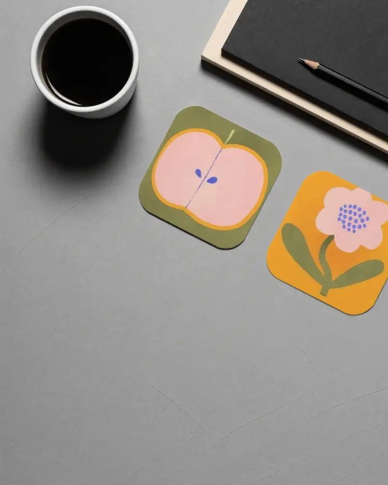 Mockup For Stylish Square Coasters With Rounded Corners And Minimalist Office Arrangement