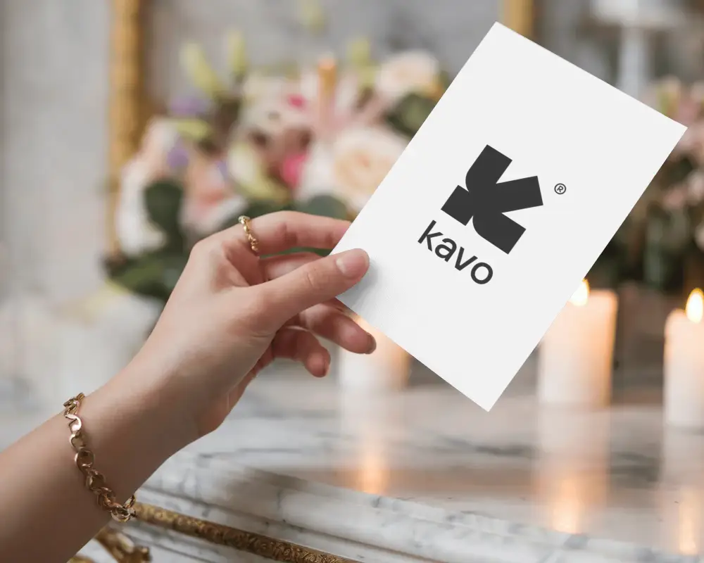 Female Hand Presenting Empty Flyer Logo Mockup In Elegant Setting For Branding Presentation Purposes