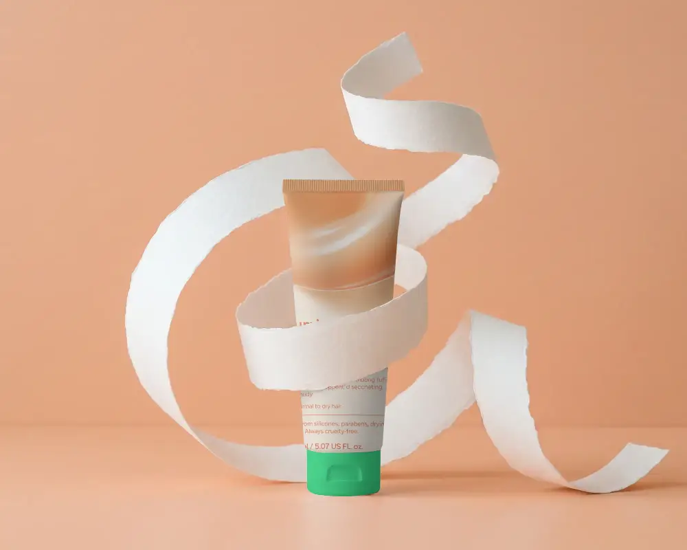 Elegant Cosmetic Tube Mockup With Curved Paper Strip Background For Brand Presentation