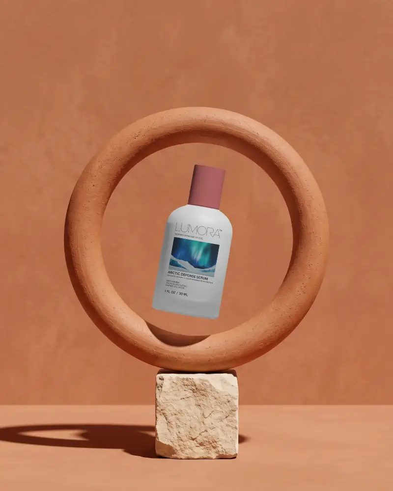 Minimalist Cosmetic Bottle Mockup Floating In Ceramic Ring On Natural Stone