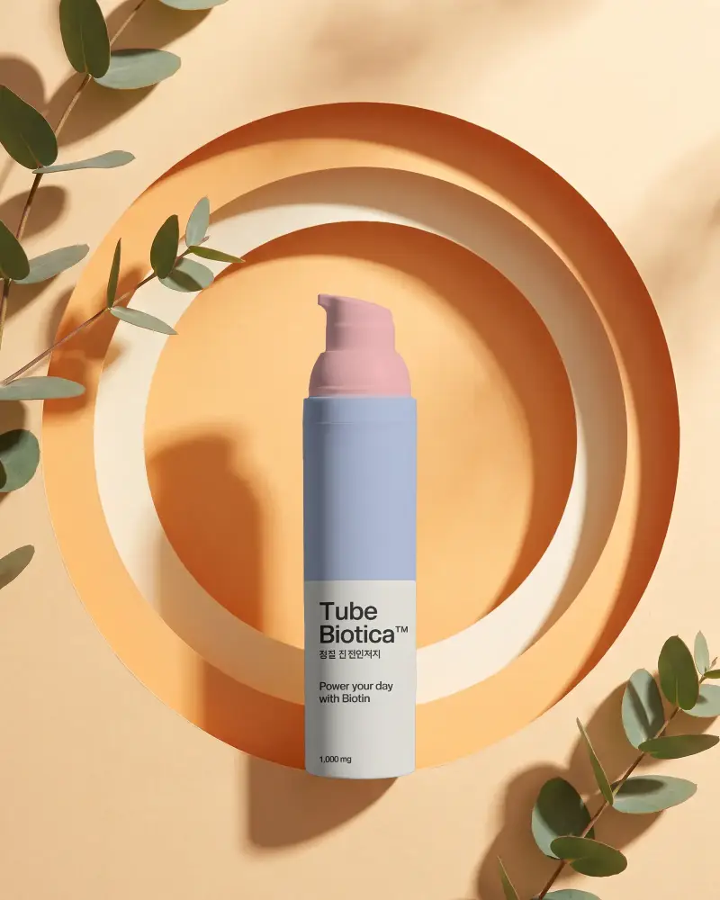 Luxury Skincare Bottle Mockup With Natural Leaves And Geometric Paper Background Design