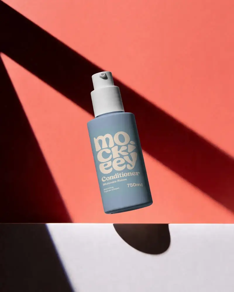 Sleek Cosmetic Bottle Mockup With Shadow Play For Beauty Product Presentation Design