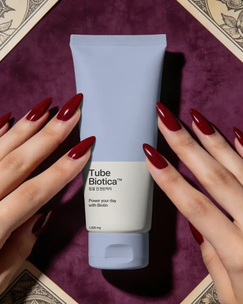 Premium Cosmetic Tube Mockup For Cream Lotion Packaging Presented With Elegant Nail Art Styling