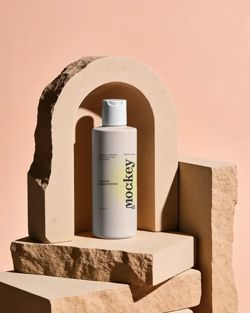 Sleek Minimalist Cosmetic Bottle Mockup On Abstract Natural Stone Display For Branding