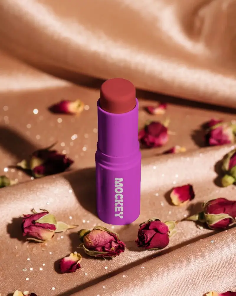 Eco Friendly Cosmetic Lipistic Mockup With Dried Rose Petals On Textured Fabric