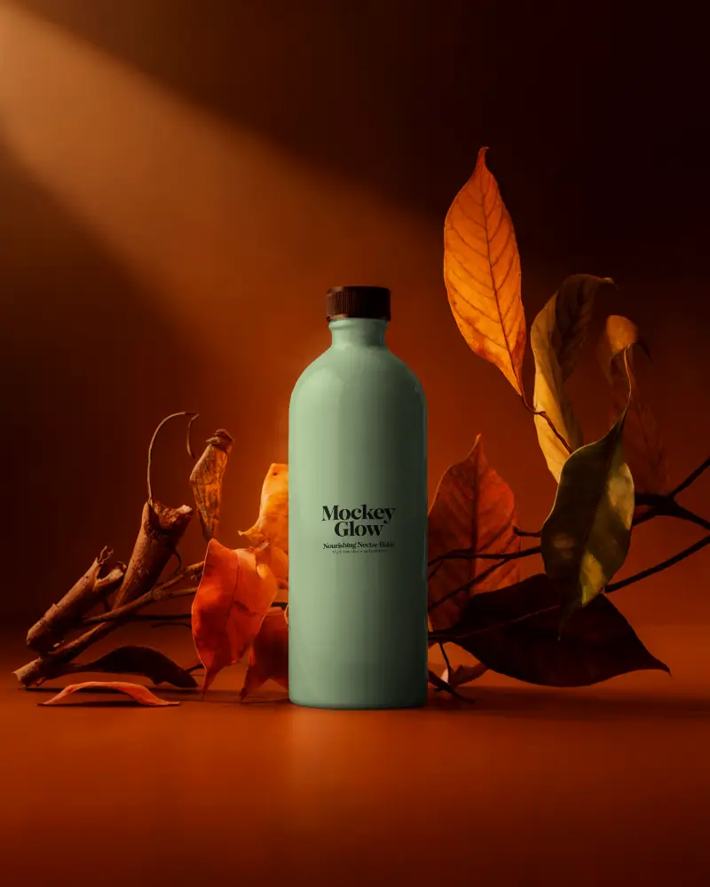 Natural Skincare Bottle Mockup With Dried Autumn Leaves And Ambient Lighting For Branding