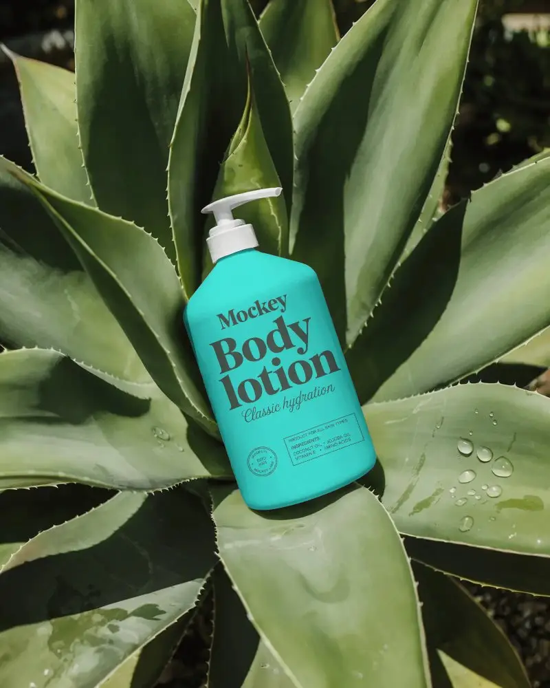 Natural Skin Care Pump Bottle Mockup On Eco Friendly Organic Aloe Leaves Background