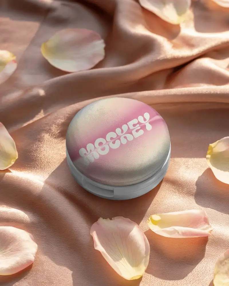 Elegant Cosmetic Case Mockup On Silk Fabric With Scattered Petals For Brand Showcase