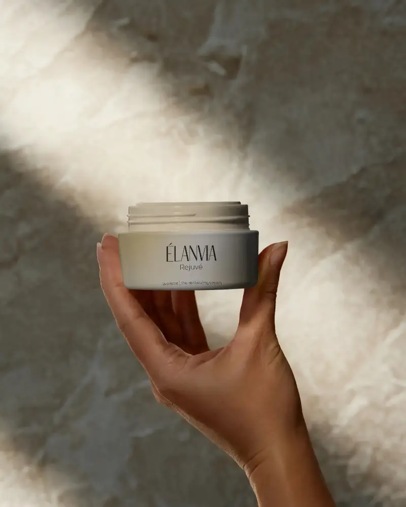 Hand Holding Cosmetic Jar Mockup For Skin Care Beauty Product Presentation