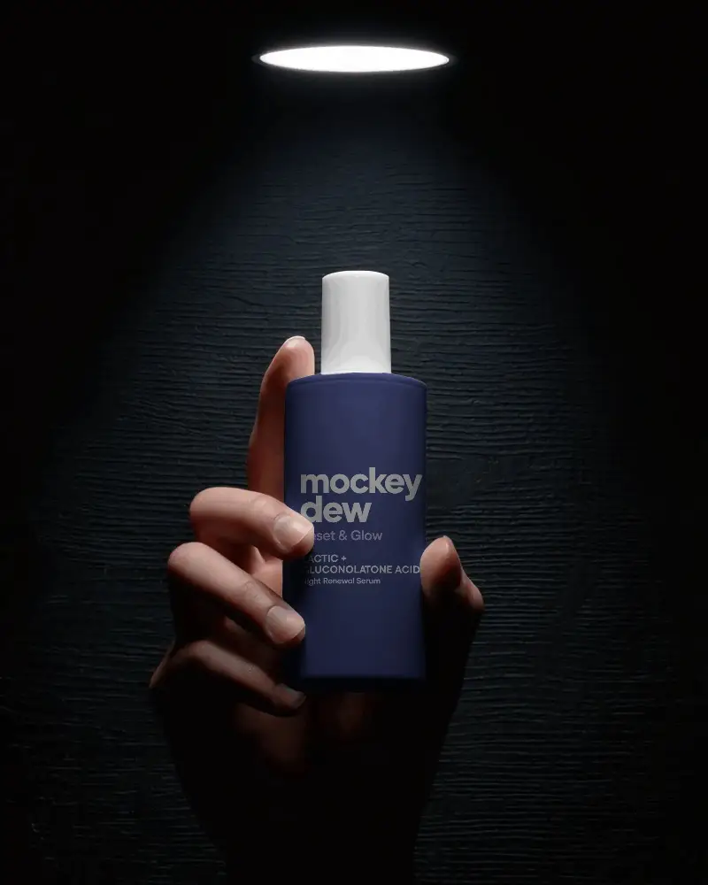 Premium Cosmetic Bottle Mockup Handheld Display For Beauty Product Promotion Dark Background