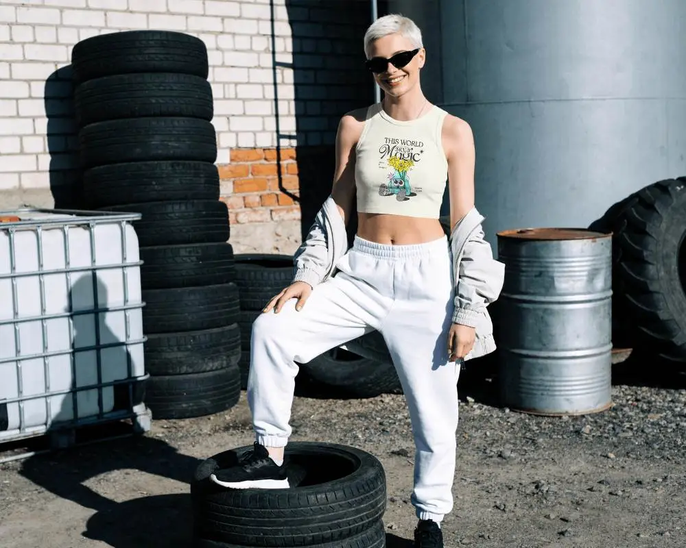 Sleeveless Crop Top Mockup Female Model Posing Outdoor Industrial Tire Yard With Streetwear