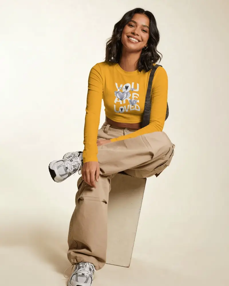 Long Sleeve Crop Top Mockup Female Model Sitting On Stool With Crossed Leg Pose In Minimal Studio