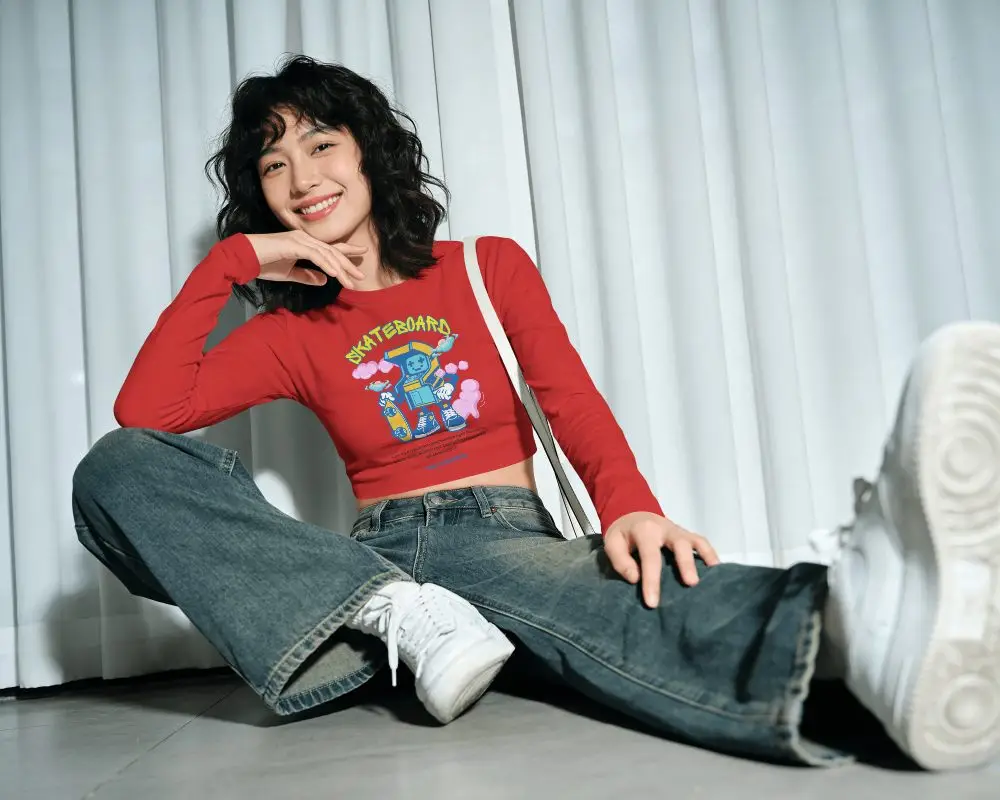 Long Sleeve Crop Top Mockup Female Model Sitting On Floor With Wide Leg Denim And Soft Curtain