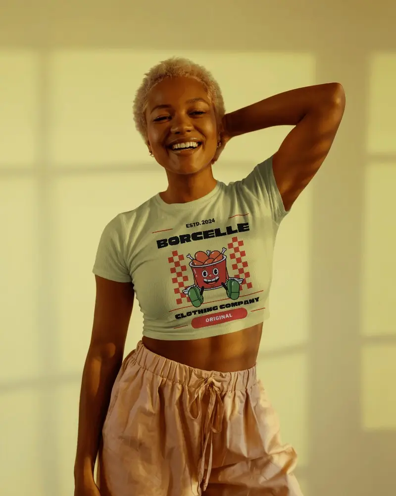 Ribbed White Crew Neck Short Sleeve Crop Top Mockup On Smiling Female Model Sunlit Interior Warm Golden Hour Lighting Relaxed And Joyful Vibe