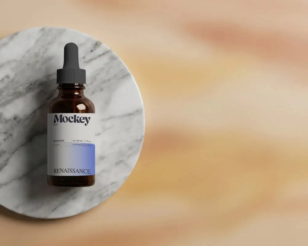 Realistic Dropper Bottle Mockup With Marble Plate Background For Cosmetic Packaging Design