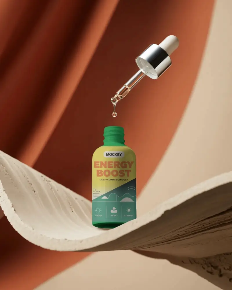 Dropper Bottle Mockup With Liquid Drop Suspended Above Bottle On Abstract Textured Background