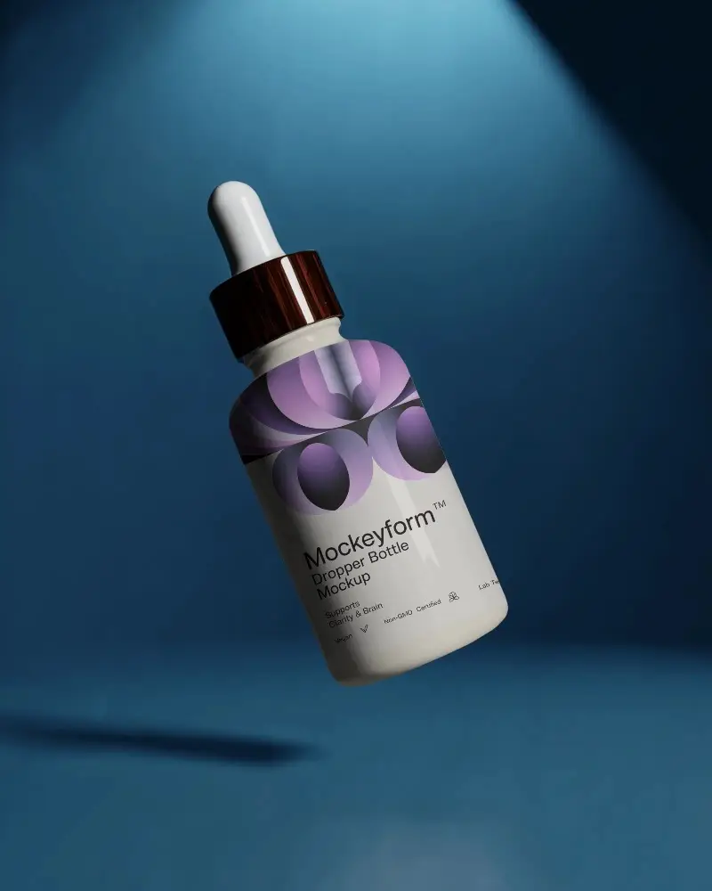 Sleek Glass Dropper Bottle Mockup With Reflective Surface On Dark Studio Background